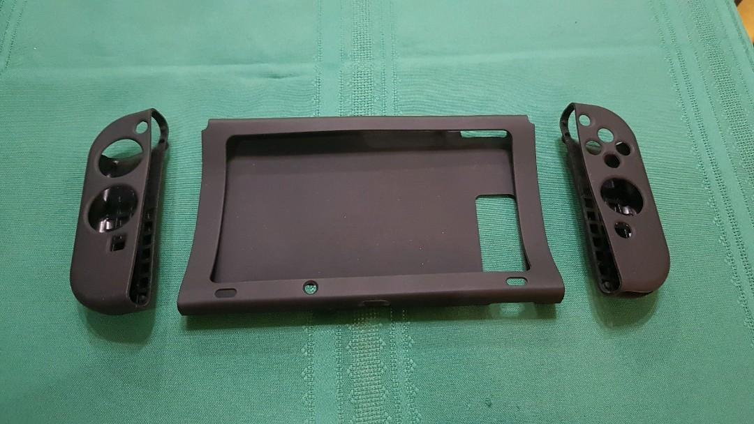 Gently Pre-Loved Black Silicon Skin for Nintendo Switch (Category: Cases & Covers) located in Quezon City. Submitted by thedailyaloy (Listing ID 262181541, Image 1). Description: Selling my gently pre-loved black silicon skin for Nintendo Switch (original, not compatible with Switch Lite). Purchased in late 2017, and used for only a few months. RFS: Bought a new protector because my Switch has blue and red Joy-Con so hindi bagay. :p.