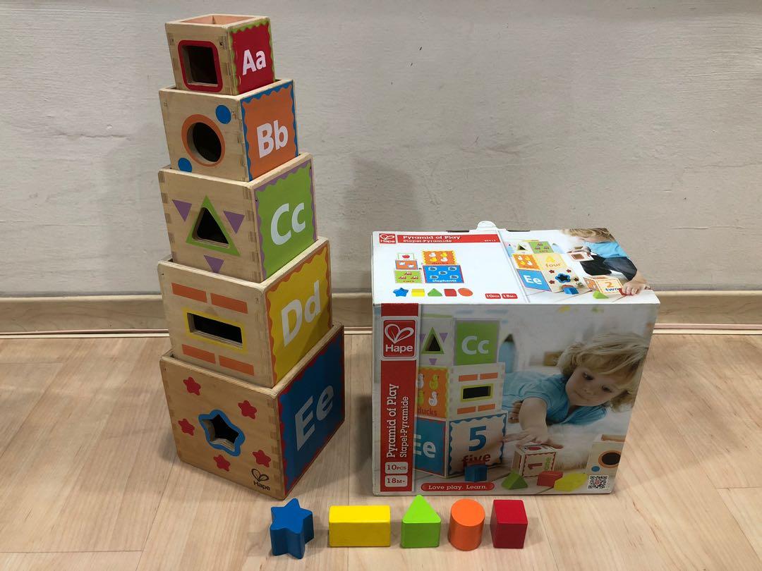 Hape pyramid top of play