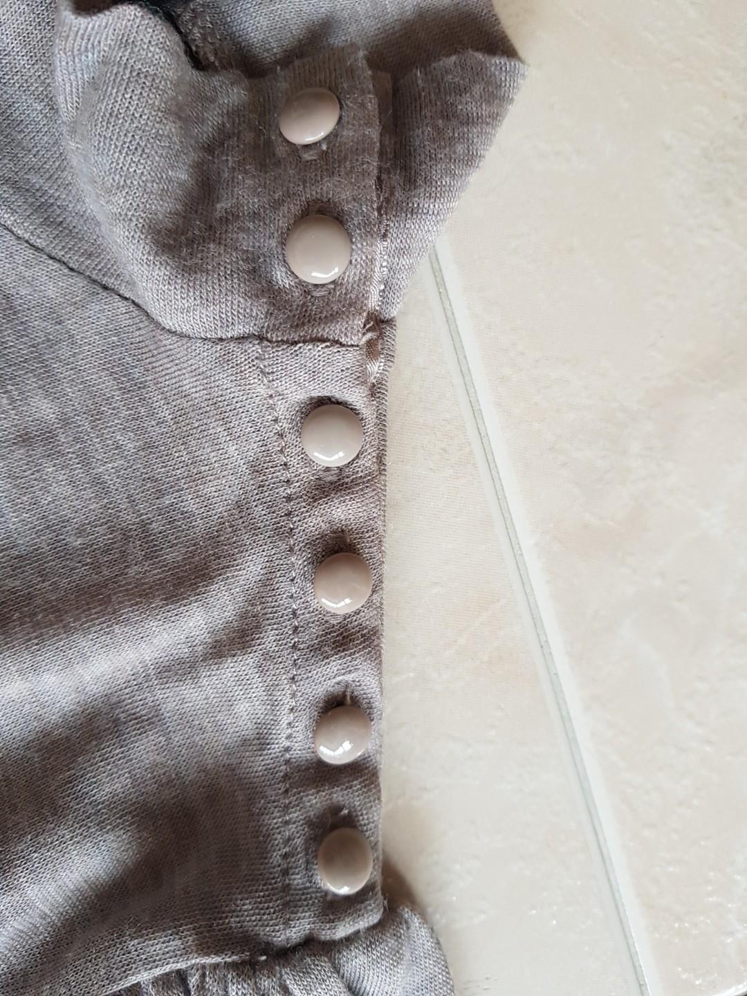Mango top brown colour (Category: Blouses) located in Singapore. Submitted by chill_101 (Listing ID 262170708, Image 2). Description: Wardrobe clearance Wash but nvr wear before Size: see photos.