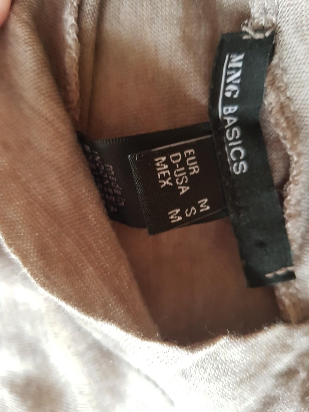 Mango top brown colour (Category: Blouses) located in Singapore. Submitted by chill_101 (Listing ID 262170708, Image 3). Description: Wardrobe clearance Wash but nvr wear before Size: see photos.