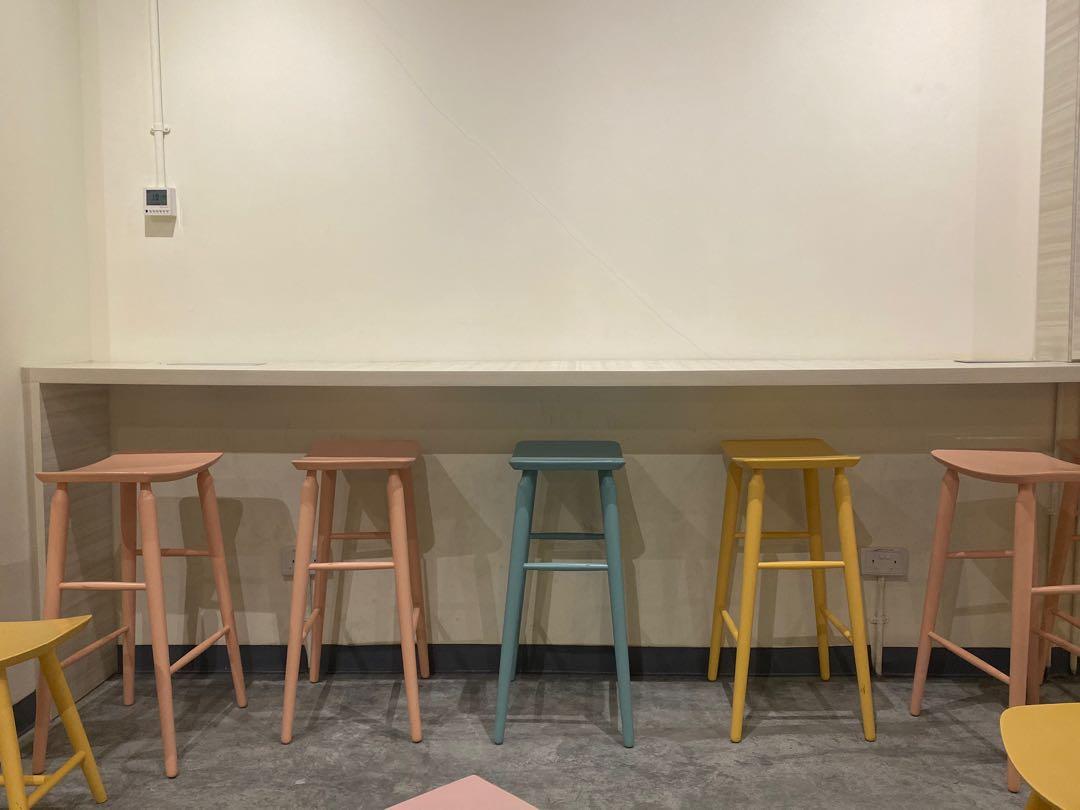 Table set (Category: Tables & Sets) located in Singapore. Submitted by bombelly (Listing ID 262177885, Image 2). Description: Small balcony/tea table and wooden chairs. Each set comes with 1 table and 2 chairs. Tables are custom made pieces with a clean, white wood laminate top that is easy to clean. Chairs come in 3 pastel colours: yellow, pink, baby blue. Original price of each chair is more than $80. Additional chairs at $15 each. .
