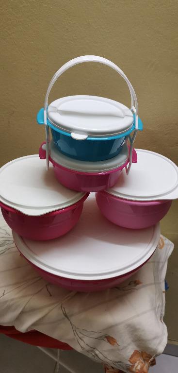 Tupperware Set (Category: Food Organisation & Storage) located in Kuala Lumpur. Submitted by hauyi93 (Listing ID 262168436, Image 2). Description: Never used before. Condition is perfectly good. The smallest 2 units of container is NOT Tupperware. It's FREE GIFT!!! Size: Big Round-Diameter 34cm, Height 13cm; Middle 2 Round-Diameter 34cm, Height 12cm Price is NOT negotiable. Cash on Delivery is available for Klang valley. I will deliver to you per