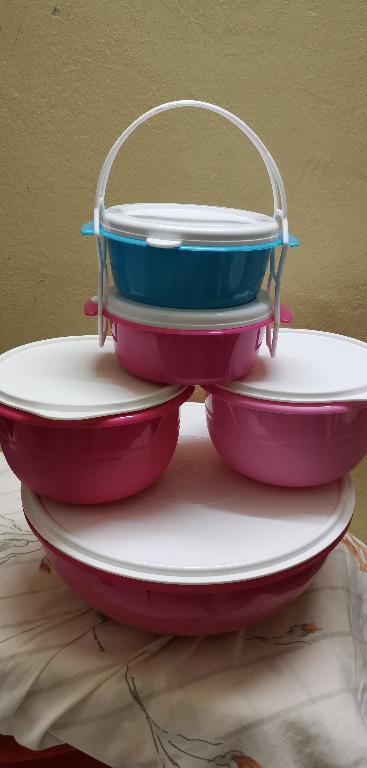 Tupperware Set (Category: Food Organisation & Storage) located in Kuala Lumpur. Submitted by hauyi93 (Listing ID 262168436, Image 1). Description: Never used before. Condition is perfectly good. The smallest 2 units of container is NOT Tupperware. It's FREE GIFT!!! Size: Big Round-Diameter 34cm, Height 13cm; Middle 2 Round-Diameter 34cm, Height 12cm Price is NOT negotiable. Cash on Delivery is available for Klang valley. I will deliver to you per