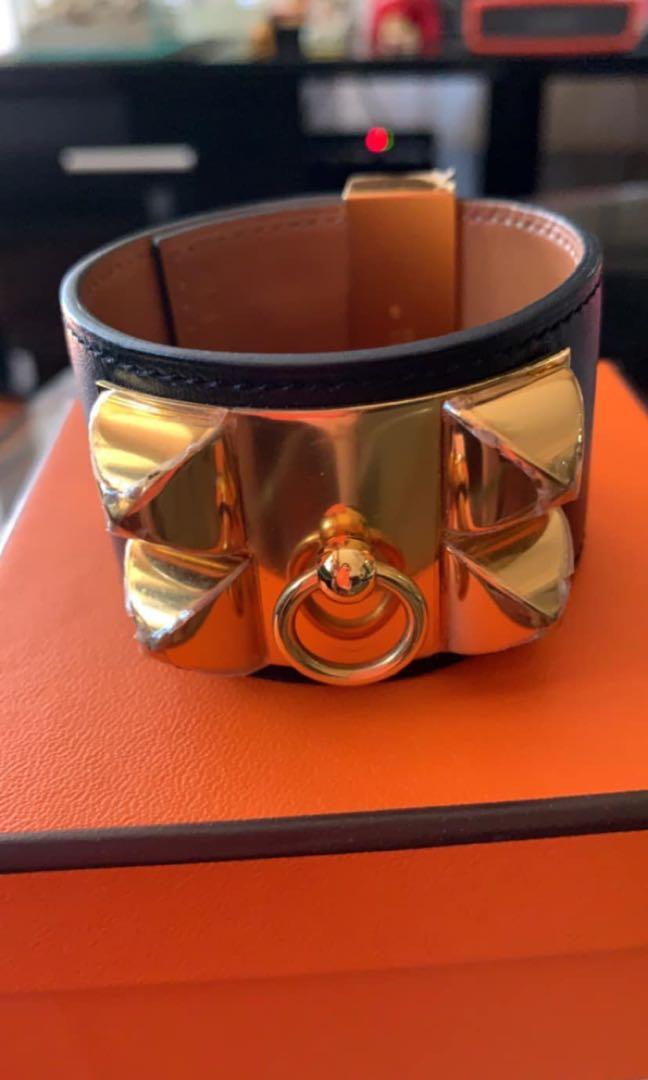 Authentic Hermes Collier de Chien Bracelet (Category: Luxury Accessories) located in Makati City. Submitted by organic_lemon (Listing ID 262257178, Image 2). Description: Pre-owned Authentic Hermes Collier de Chien Bracelet in box Calfskin with gold plated Medor pyramid studs and ring with plastic cover still intact, adjustable closure Wrist size approx. 7.5" Color noir .