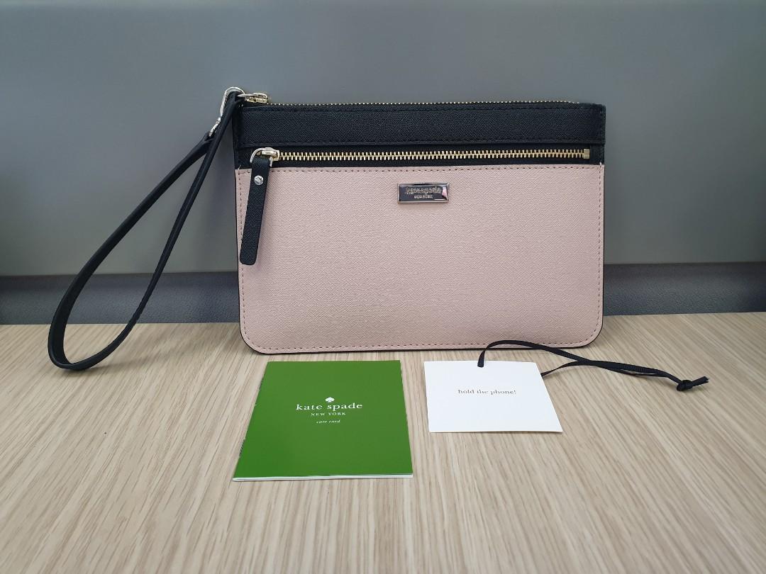 Kate Spade Laurel Way Tinie Wristlet, Women's Fashion, Bags & Wallets,  Purses & Pouches on Carousell