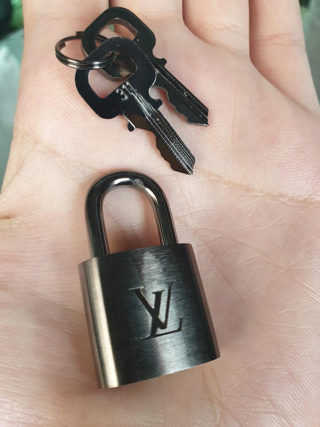 Louis vuitton authentic locks / bag charm or accessory (Category: Luxury Accessories) located in San Juan City. Submitted by akioza (Listing ID 262528906, Image 1). Description: EDIT : reduced. check LAST PICS (the rest are sold). just found the other lock that's exactly same recently. the padlock is same but keys are diff.but compatible & the type that's attached to the leather bag tag (similar to / same as the prada and hermes typical small lea