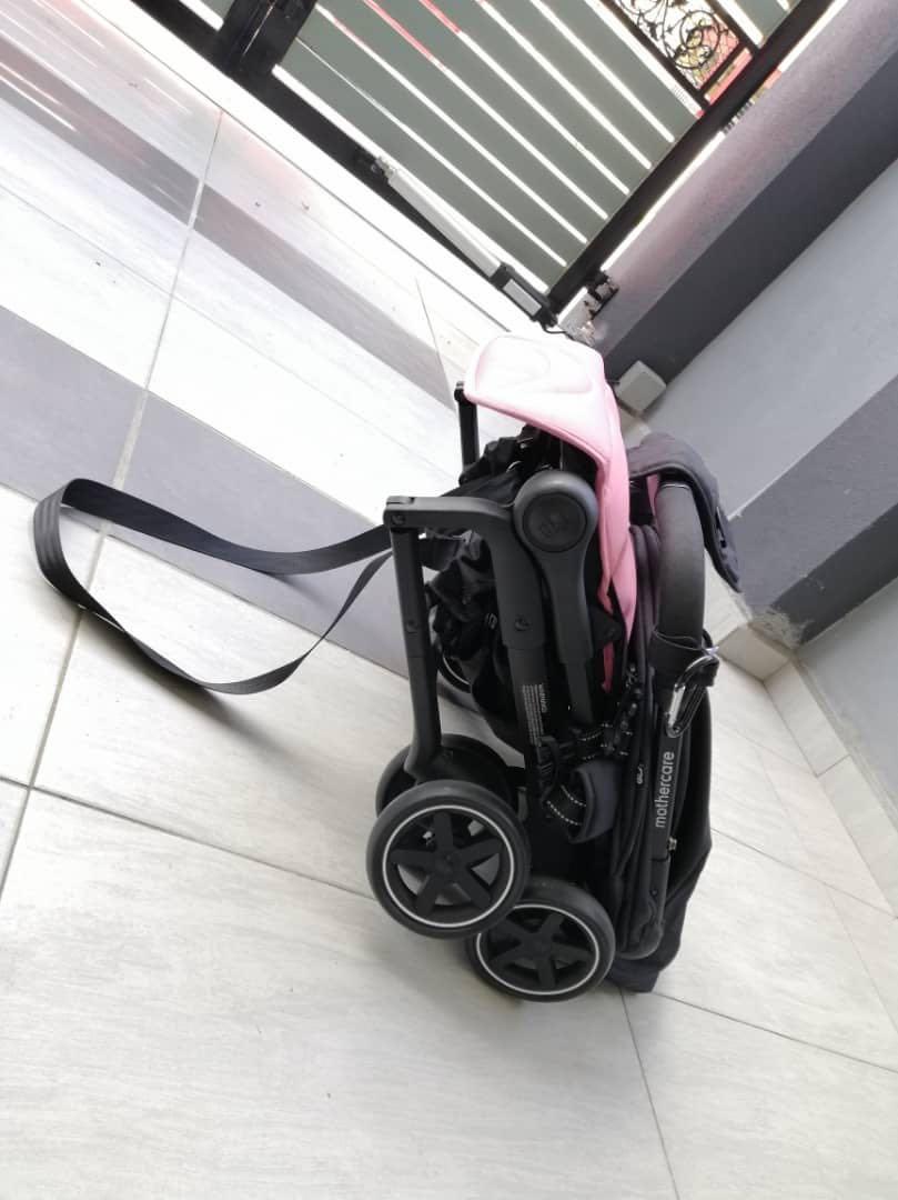 Mothercare ride stroller hot sale pink