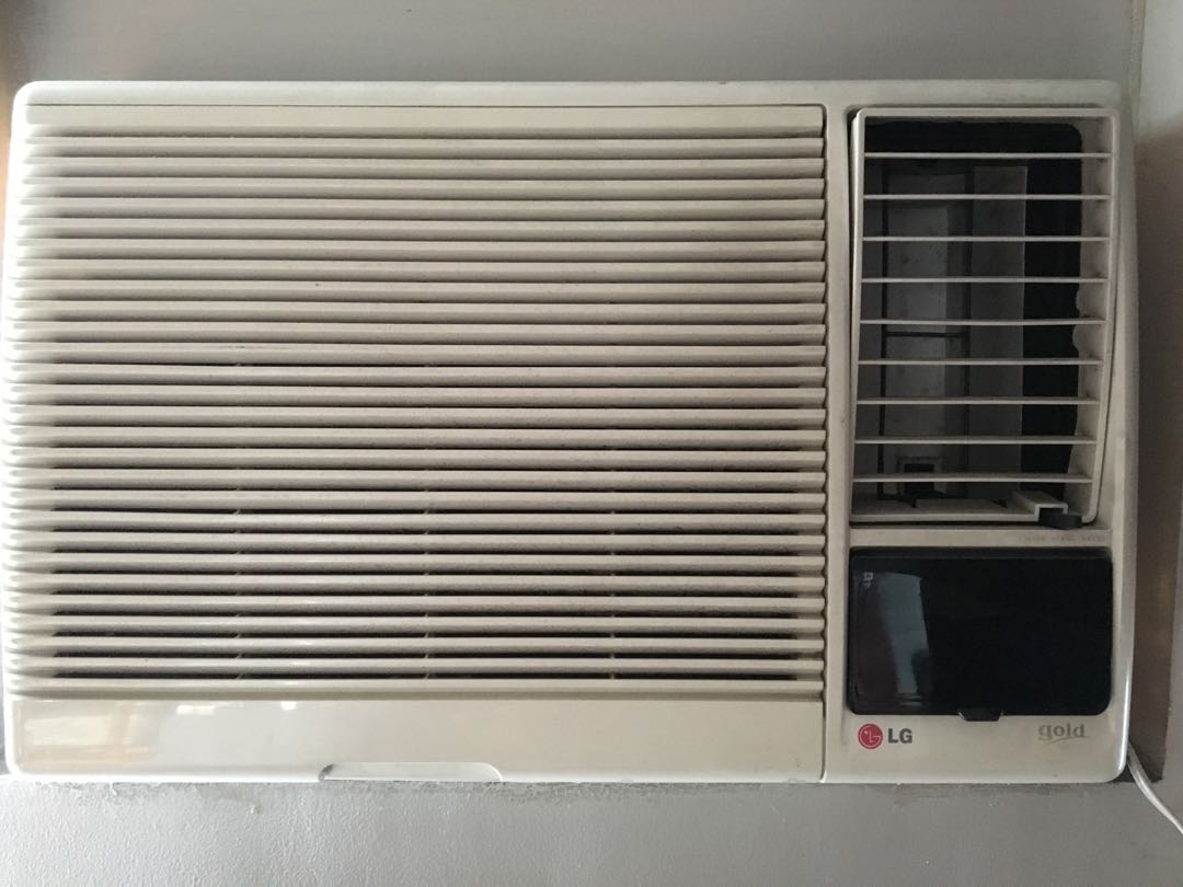 LG 1.5hp aircon window type with remote control and timer., TV & Home