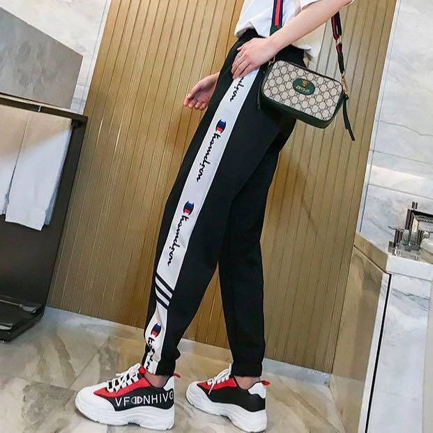 Champion black & top red taping track pants