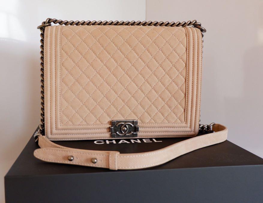 Authentic CHANEL LE BOY LARGE MATTE CAVIAR (Category: Luxury Bags & Wallets) located in Cagayan de Oro. Submitted by moiobsession (Listing ID 263236858, Image 1). Description: CHANEL Large Le Boy Matte Caviar Quilted Flap Shoulder Bag in Ruthenium or Aged Silver Hardware. -Actual Color Light Grayish Brown. Series 2014. -with dustbag -Push lock CC logo closure. -Textile lined compartment w/ a wall zip pocket, slip pocket, & a key clipper leather s