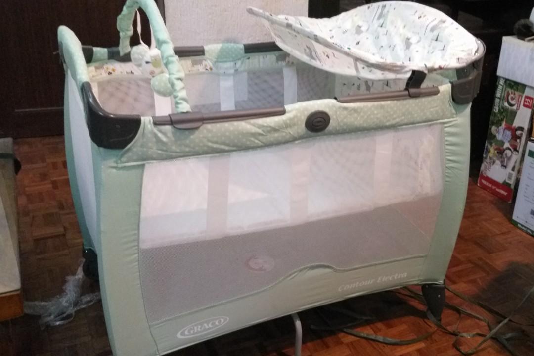 Graco Crib (Category: Cots & Cribs) located in Mandaluyong City. Submitted by onetraveler76 (Listing ID 263315351, Image 1). Description: Barely used. Cosleeping works for us. :) Very nice. Unisex color. Uk Style with music and vibration. Small tear on the changing cot, can be easily stitched..