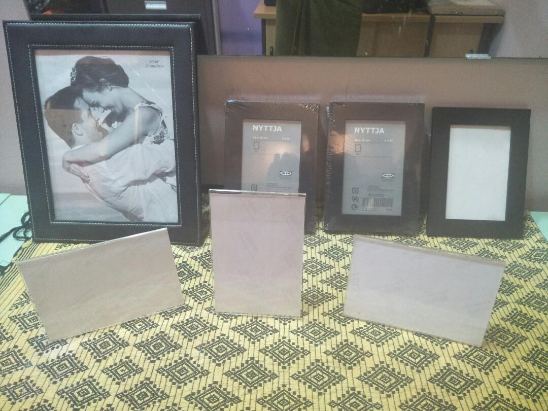 Photo Frames (Category: Frames & Pictures) located in Singapore. Submitted by vanan30 (Listing ID 263227139, Image 1). Description: 9 Pcs of new photo frames going for $15 only . Fast deal .worth the price Different sizes.