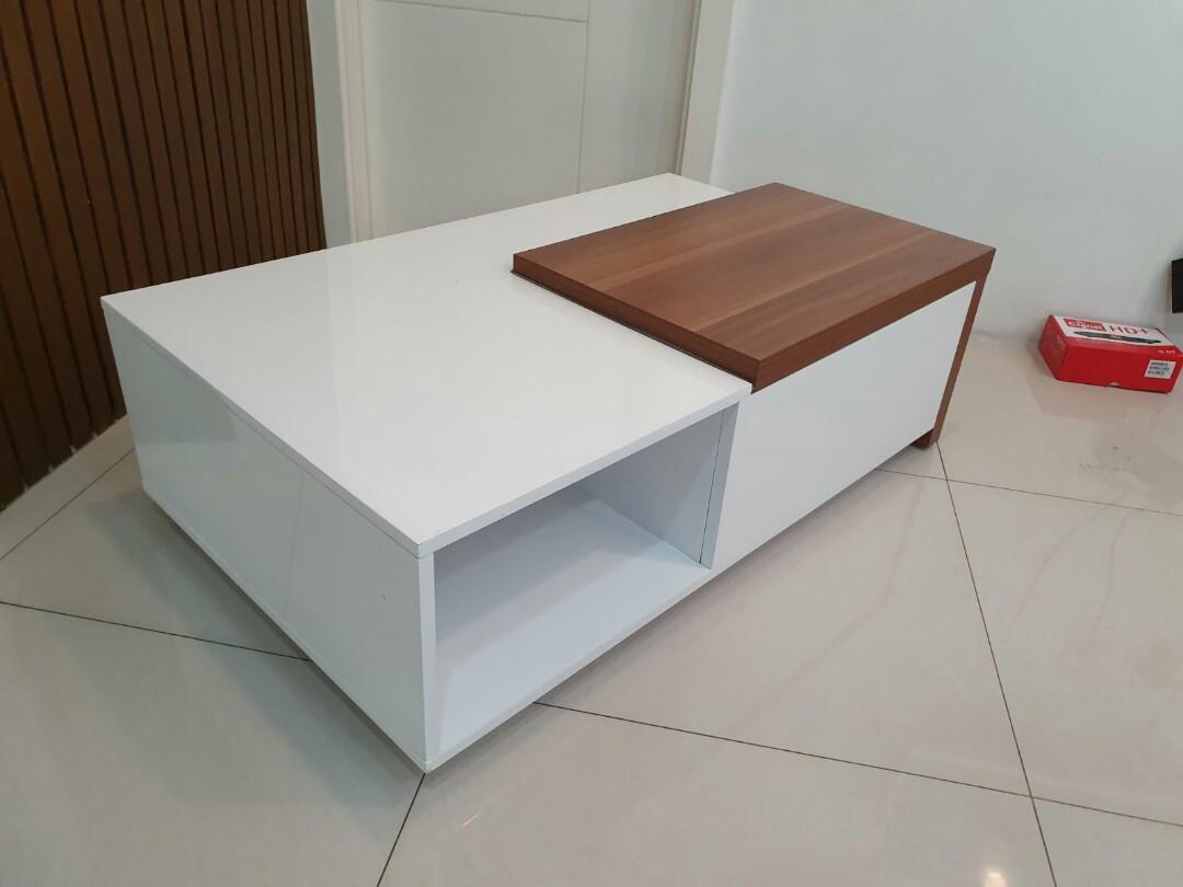 White center table (Category: Tables & Sets) located in Quezon. Submitted by chanel81 (Listing ID 263373983, Image 1). Description: Gently used modern center table with a spacious sliding wood compartment in white duco finish. Original price was P12,000. Selling low to free up space. Conditon: excellent used condition except for 2 small dots on the white top as shown in pictures. Size: 12.5" H x 23.75" W x 41" L Rfs: spare table Sf c/o buyer or p