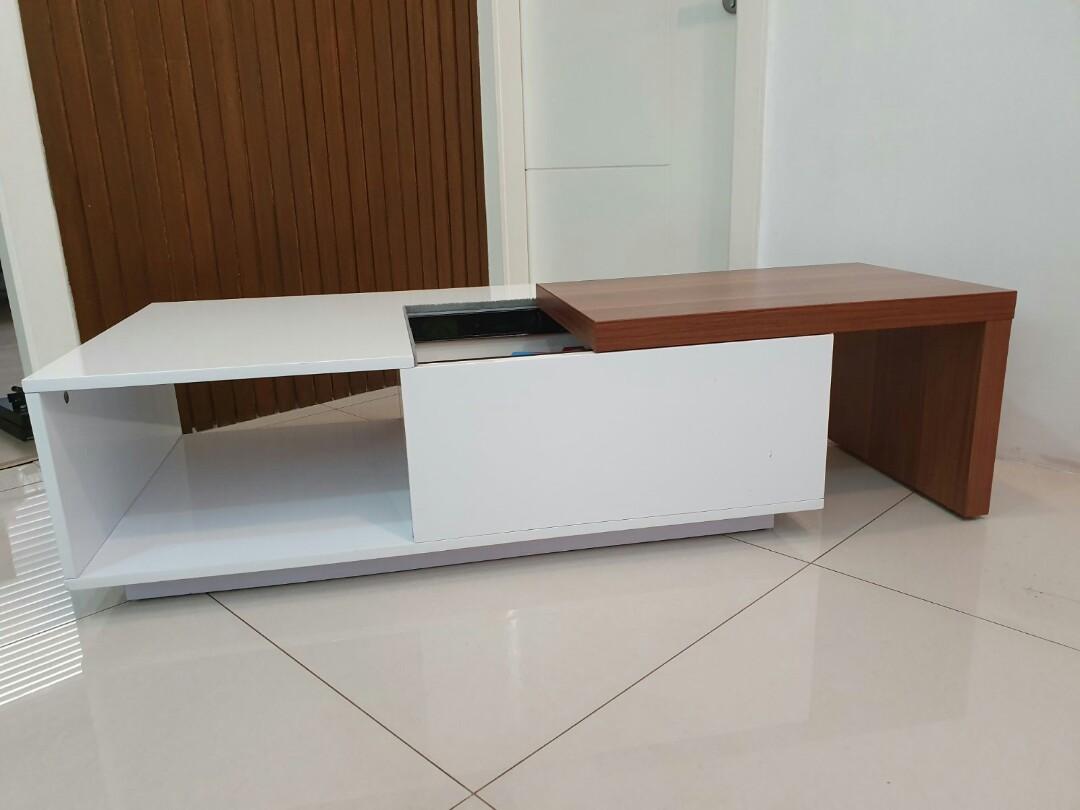 White center table (Category: Tables & Sets) located in Quezon. Submitted by chanel81 (Listing ID 263373983, Image 3). Description: Gently used modern center table with a spacious sliding wood compartment in white duco finish. Original price was P12,000. Selling low to free up space. Conditon: excellent used condition except for 2 small dots on the white top as shown in pictures. Size: 12.5" H x 23.75" W x 41" L Rfs: spare table Sf c/o buyer or p