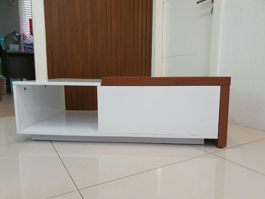 White center table (Category: Tables & Sets) located in Quezon. Submitted by chanel81 (Listing ID 263373983, Image 2). Description: Gently used modern center table with a spacious sliding wood compartment in white duco finish. Original price was P12,000. Selling low to free up space. Conditon: excellent used condition except for 2 small dots on the white top as shown in pictures. Size: 12.5" H x 23.75" W x 41" L Rfs: spare table Sf c/o buyer or p