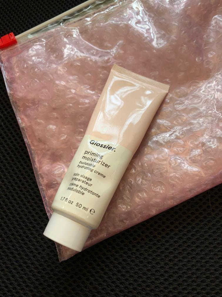 Glossier priming misturizer (Category: Face Care) located in Quezon City. Submitted by lovingsh0pping (Listing ID 263584159, Image 1). Description: Used 4times only Just to try it It was given to me as a gift by a friend from the US. Authentic No longer putting anything on my face Pouch not included .