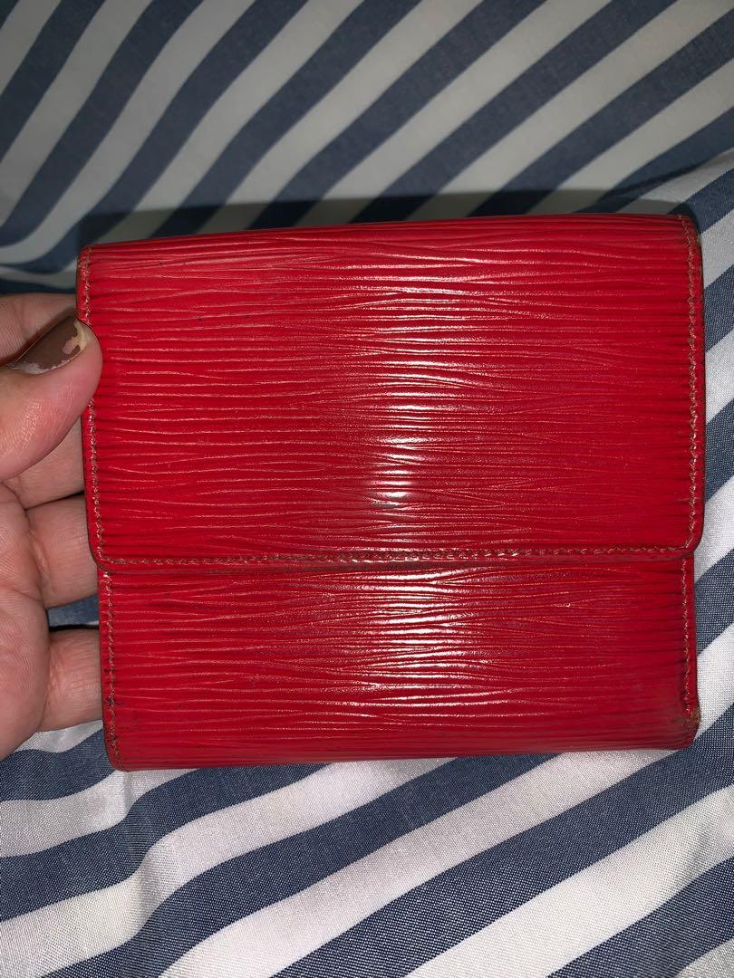 Authentic Louis Vuitton EPI compact wallet (Category: Luxury Bags & Wallets) located in Quezon City. Submitted by luxuryphloved (Listing ID 261078863, Image 1). Description: Authentic Louis Vuitton compact wallet With serial number/ serial code Good used condition Peeling inside but not sticky.
