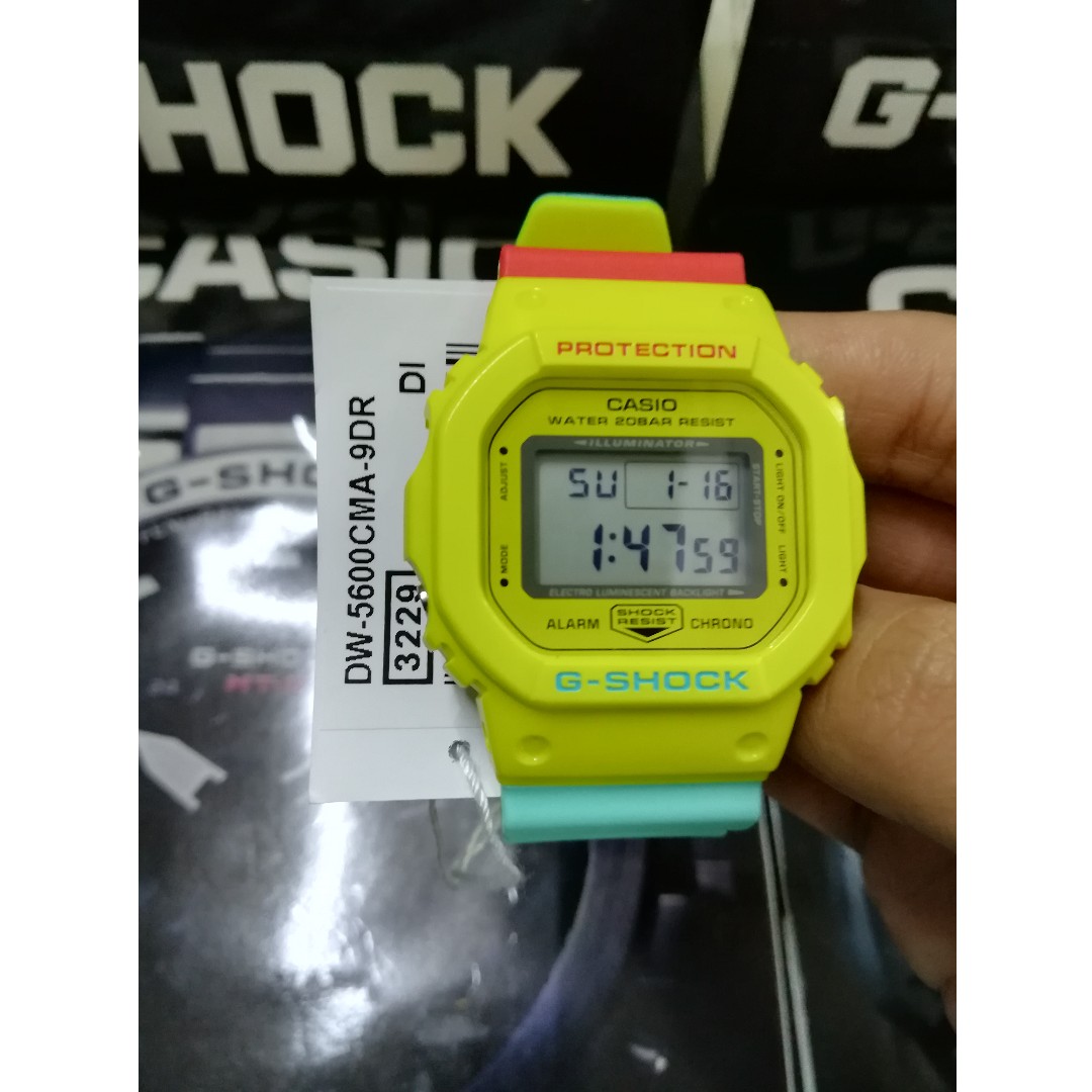 Casio G Shock Mid Sized Breezy Rasta Color Series Watch DW5600CMA