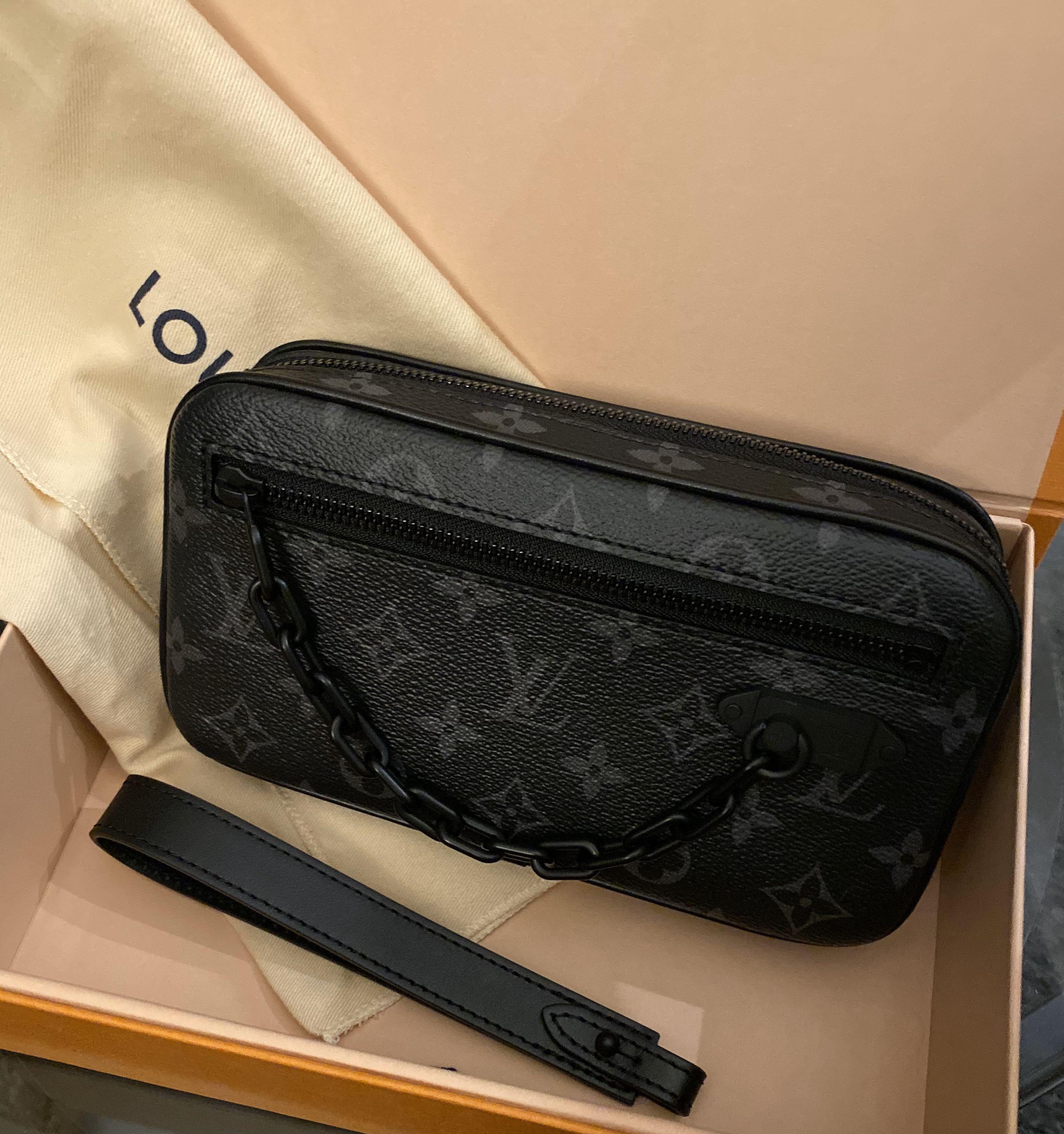 LOUIS VUITTON Pochette Volga Monogram Eclipse, Luxury, Bags & Wallets on  Carousell