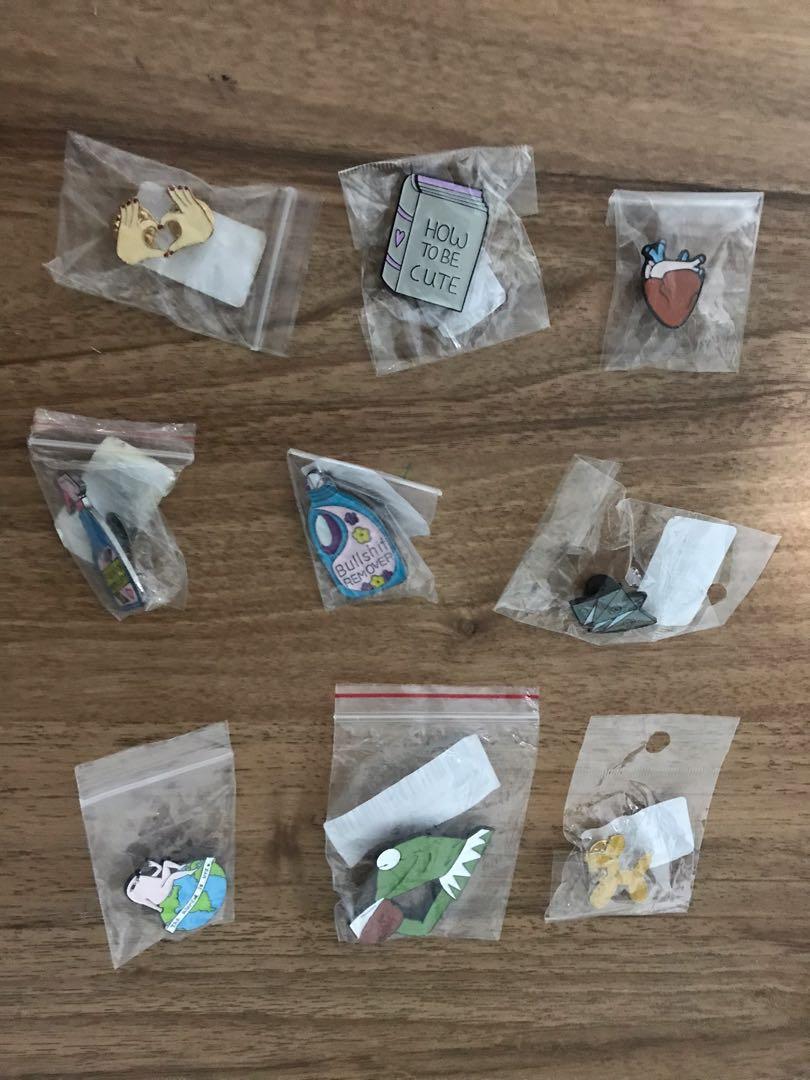 Brooch Enamel Pins (Category: Brooches) located in Quezon City. Submitted by mumsy1925 (Listing ID 255350269, Image 2). Description: BRAND NEW. Never used. Extra stock. Selling for P50 each. Fuokboi Repellent Bullshit Remover Detergent Kermit Tea Forever Ever Skeleton- SOLD Origami Happy Sad Heart Heart Dog Balloon Finger Heart Cat Middle Finger - SOLD Cute Book Shit Happens Toilet Paper- SOLD RFS:decluttering.