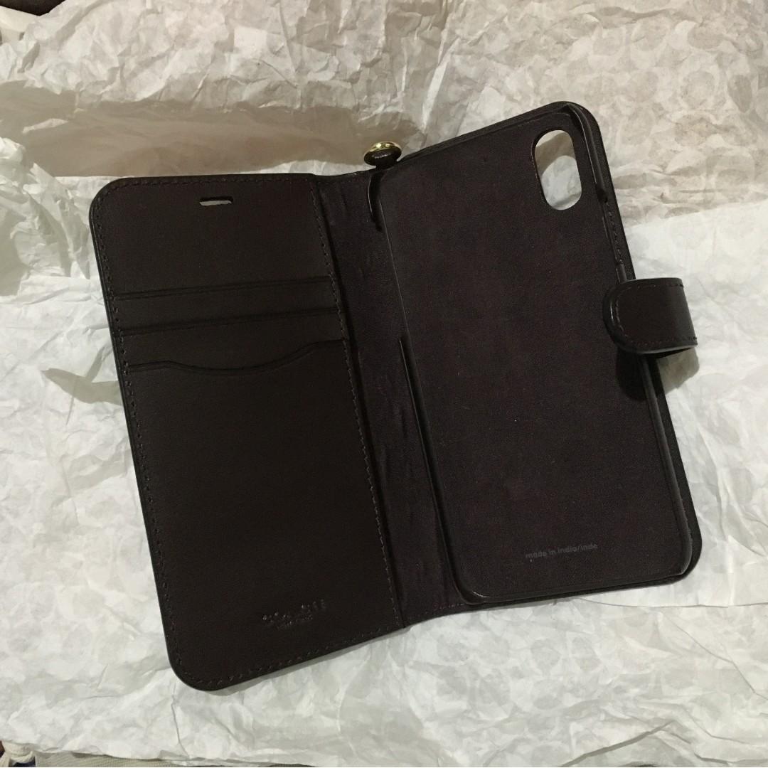 Coach leather case for iPhone X/XS (Category: Cases & Sleeves) located in Pasig City. Submitted by drewmad (Listing ID 264480063, Image 3). Description: Used once no longer needed Strap was misplaced Original Coach leather case MOP: BDO/Gcash Meet-up: Marikina/San Mateo Shipping: Fastrack/lalamove.