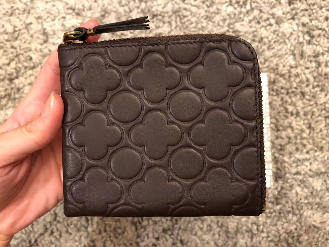 Comme des garcons store clover embossed zip wallet
