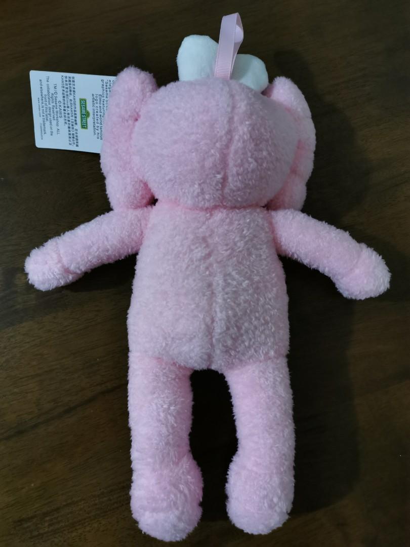 https://media.karousell.com/media/photos/products/2019/11/26/kaws_x_pink_bff_dior_special_design_plush_cd_soft_doll_toy_patung_with_tag_art_display_figure_fluffy_1574698073_7da064fb_progressive.jpg