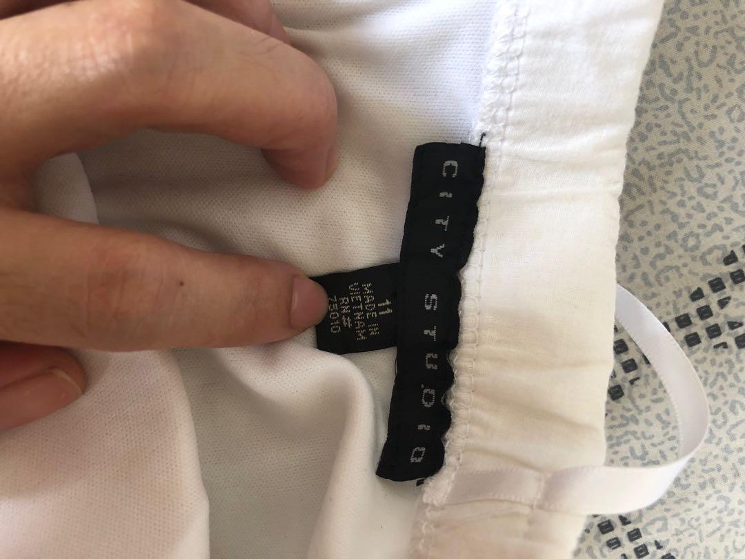 White tube dress (Category: Dresses) located in Manila. Submitted by karagregorio (Listing ID 264460937, Image 3). Description: ‼️50 pesos only.