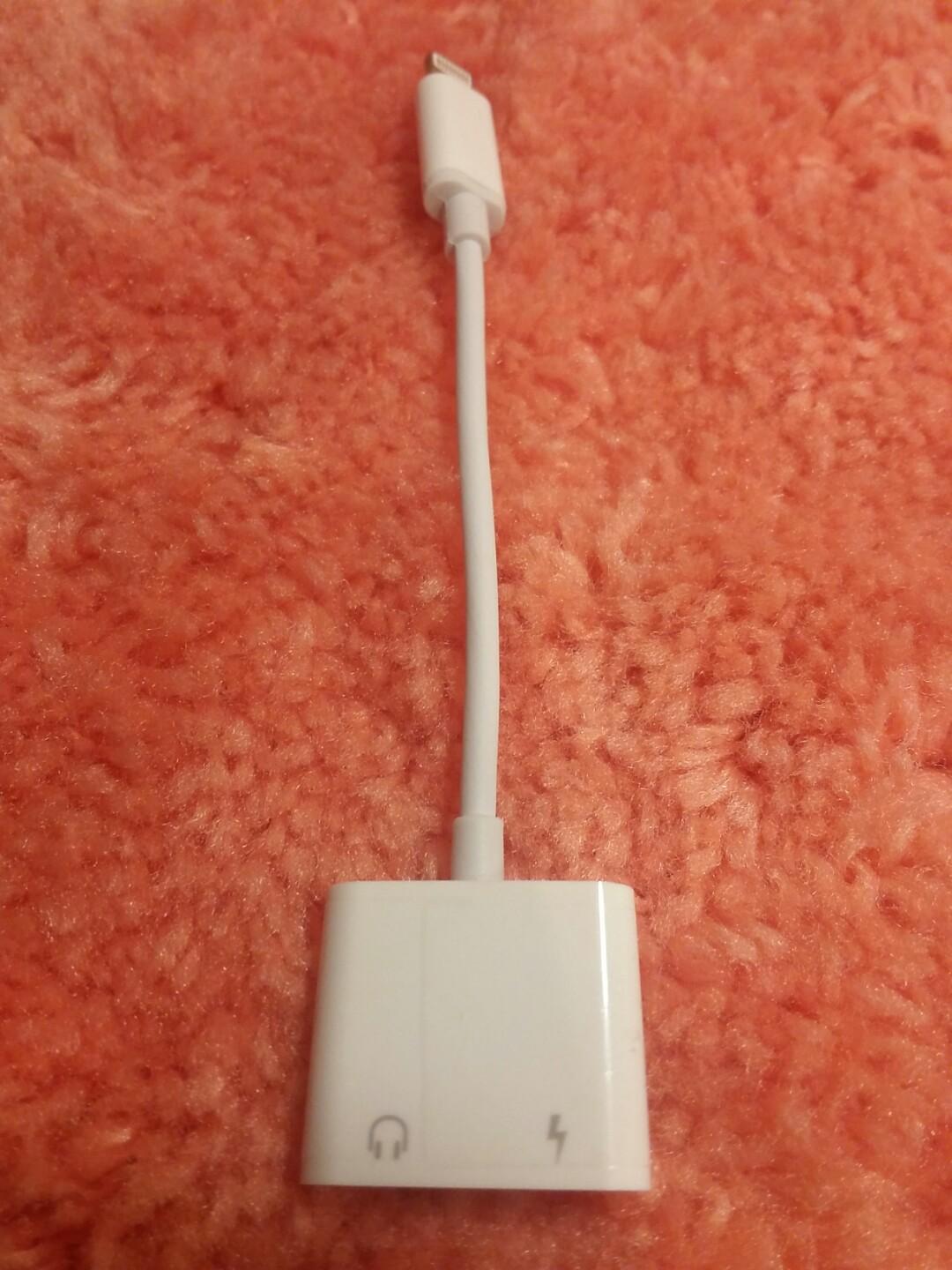 2 n 1 Adapter (3.5mm jack & Lighting cable) (Category: Chargers & Cables) located in Lapu Lapu. Submitted by everydays_needs (Listing ID 264696456, Image 1). Description: White color.