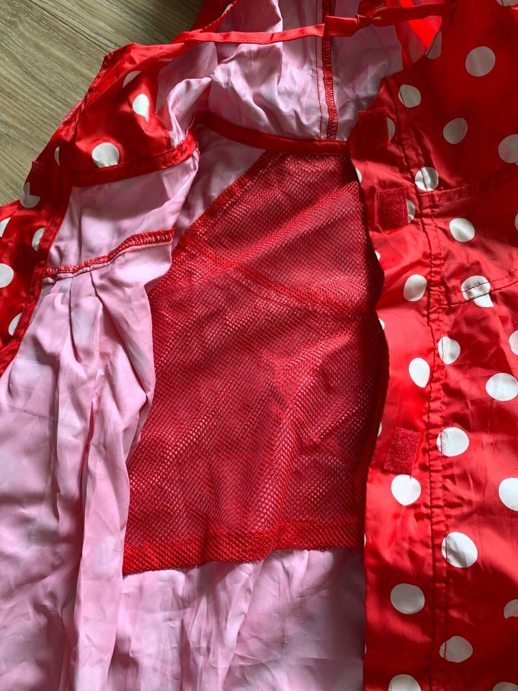 Red polka shop dot raincoat
