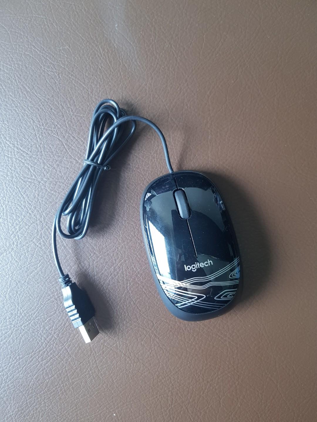 Logitech wired mouse (Category: Mouse & Mousepads) located in Singapore. Submitted by MiyamotoMusashii (Listing ID 264886412, Image 1). Description: Used for 1 time only. Logitech model no. M105 Very new condition.