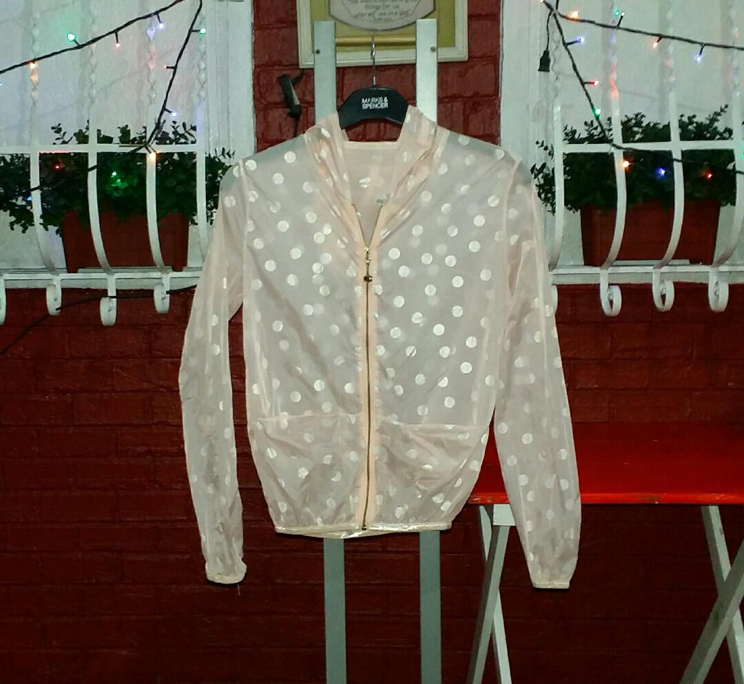 Unbranded Peach RAIN JACKET with hood (Category: Others Tops) located in Quezon City. Submitted by donjie (Listing ID 264812503, Image 1). Description: RAIN JACKET #271 Brand: Unbranded Color: Peach Design: Transparent with silver polka dot and hood Size: Small Shoulder: 14.5 inches Chest: 40 inches Armhole: 18 inches Length: 24 inches Sleeve Length: 24 inches P120 Shipping Fee P60.