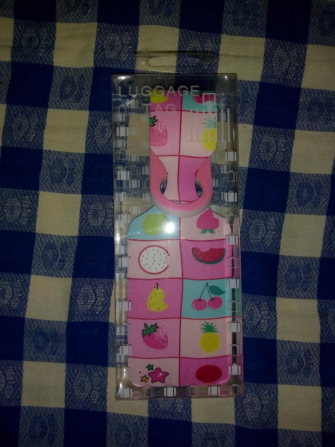 Pink luggage tag (Category: Luxury Bags & Wallets) located in Quezon City. Submitted by sweetlikesoju (Listing ID 264906158, Image 1). Description: Pink with fruits print 👥 No meet-ups for safety purposes 📦 GoGo Xpress / Grab Express / Mr. Speedy from Novaliches, QC 💳 GCash / coins.ph / PayMaya / PayPal / BPI.