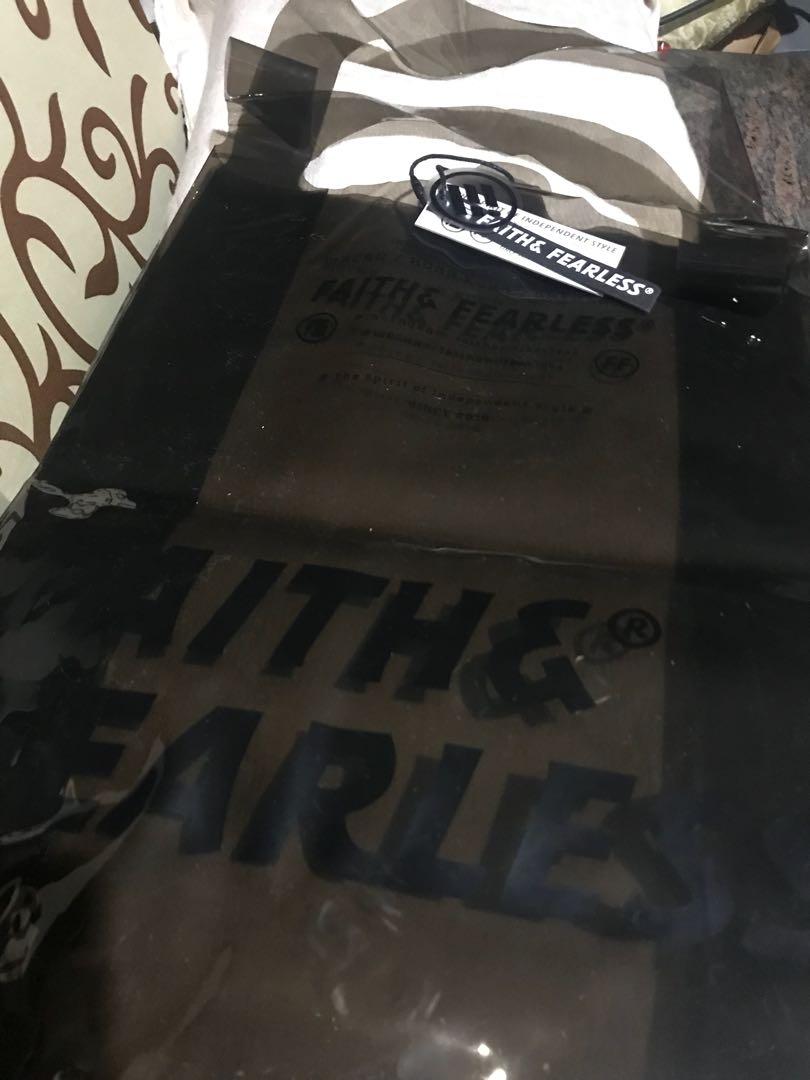 Faith & Fearless Black Bag (Category: Tote Bags) located in Quezon City. Submitted by candor_ (Listing ID 265331214, Image 2). Description: Hong Kong-based designer, Faith & Fearless black translucent bag. Can fit long brown envelopes. .