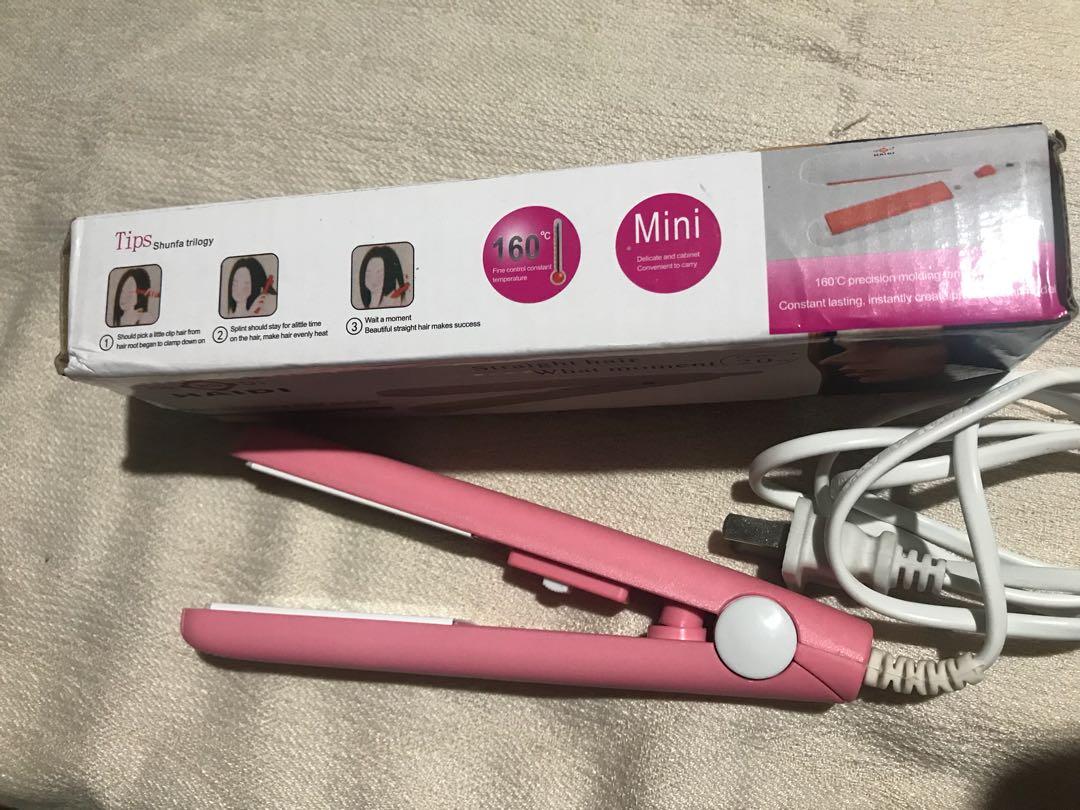 Mini Hair Straightening Iron (Category: Hair) located in Quezon City. Submitted by candor_ (Listing ID 265396215, Image 1). Description: Unused except for testing. No damages and no issues. .