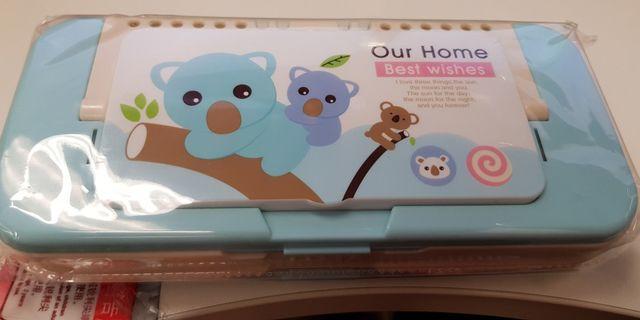 To Bless. 2x Pencil case. Comes with small drawing board and marker.