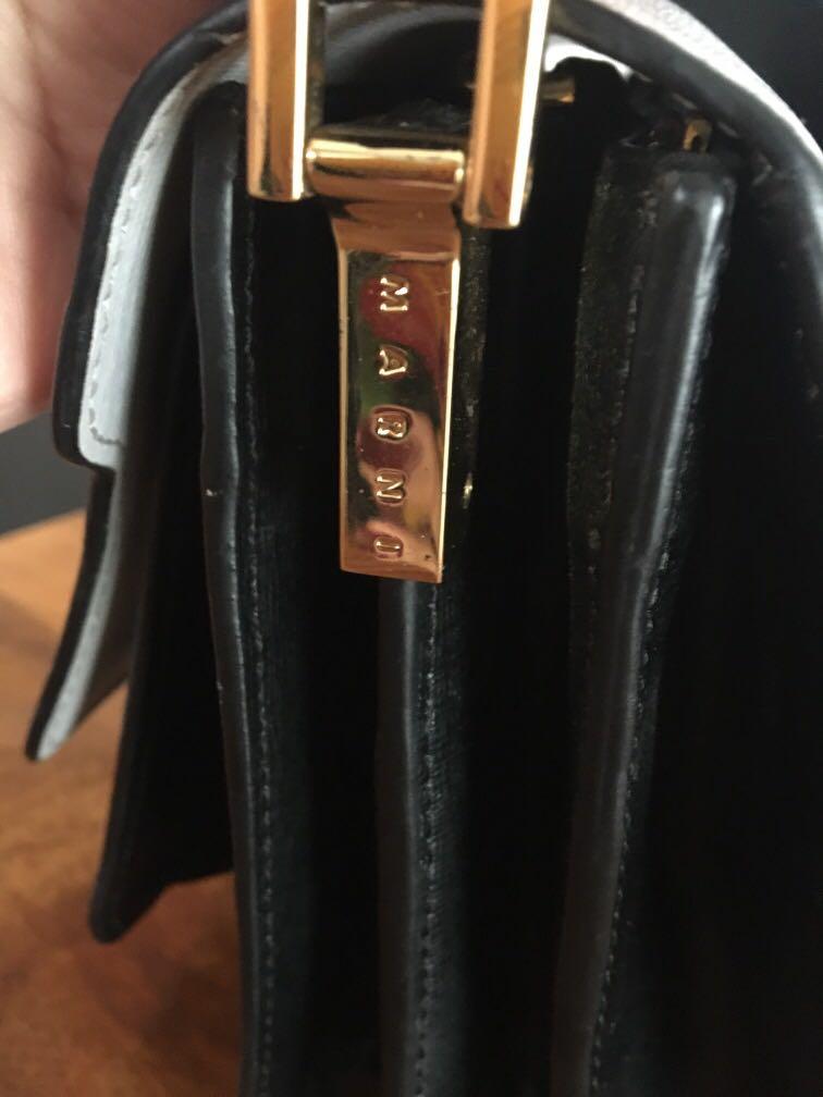 Marni trunk bag (Category: Luxury Bags & Wallets) located in Antipolo. Submitted by shopitsmeanttobe (Listing ID 265492149, Image 2). Description: Marni trunk bag - walang made in italy na stamp -may flaws po sa lock and tarnish ung haedware as seen on photo as seen on crash landing on you cloy ep 16 yoon seri may flaws po pki tignan nlng po sa pictures :).
