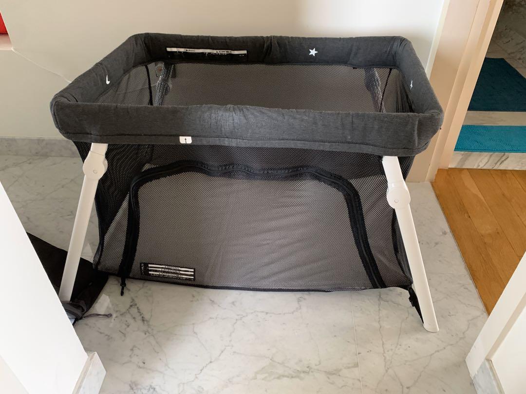 lotus travel crib carry on