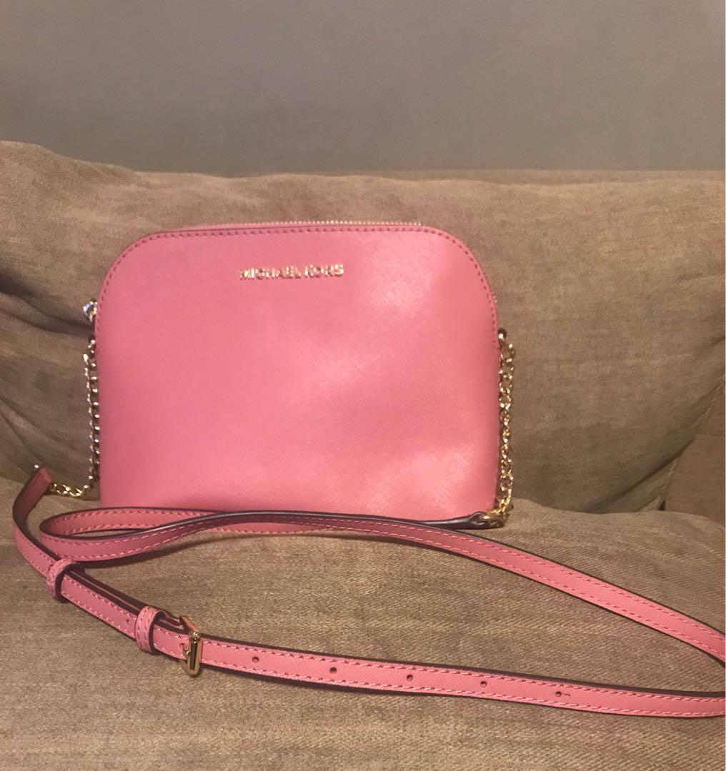 Michael Kors Sling Bag (Category: Cross-body Bags) located in Mandaluyong City. Submitted by Declutter_Princess (Listing ID 265757496, Image 1). Description: Authentic Brandnew Bag only with tag/card From the US Plus sf .