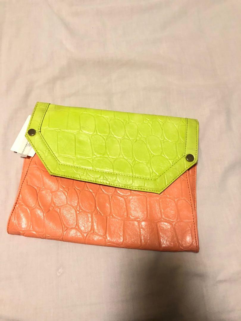 Neon clutch, Women's Fashion, Bags & Wallets, Clutches on Carousell