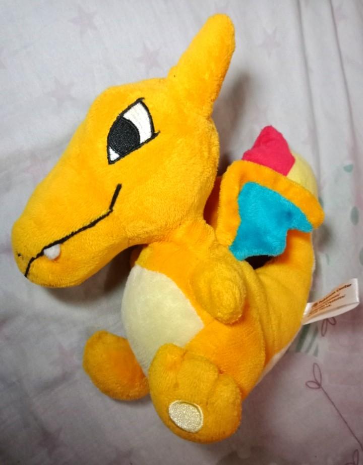 Pokemon charizard (Category: Plushies & Soft Toys) located in Manila. Submitted by happyshoppersph (Listing ID 265651409, Image 1). Description: Hood as new naman po wala lang paper tag.. Original charizard pokemon center plush doll.