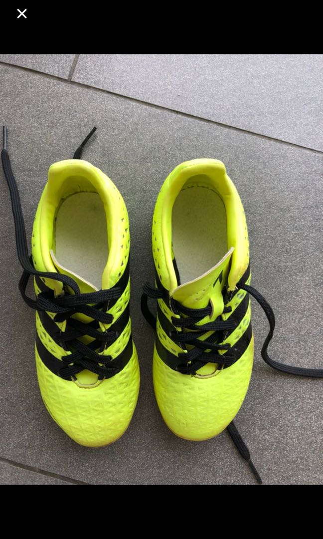 green messi football boots