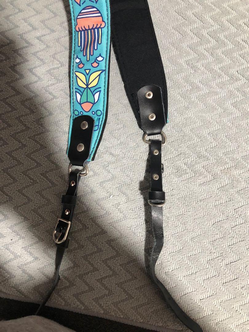 Camera Strap (Category: Cameras) located in Taguig. Submitted by donjon01 (Listing ID 265792089, Image 1). Description: Super cute camera strap that’s great for dslr’s!!! used this for my mirrorless camera and it wasn’t too bulky for it either :) it’s very secure and isn’t uncomfy around the neck or on your shoulder.