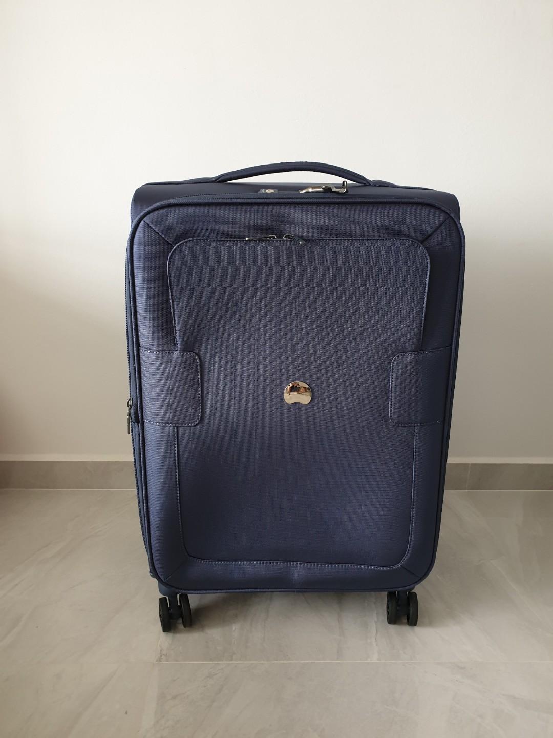 Delsey navy blue soft luggage, Hobbies & Toys, Travel, Luggage on Carousell
