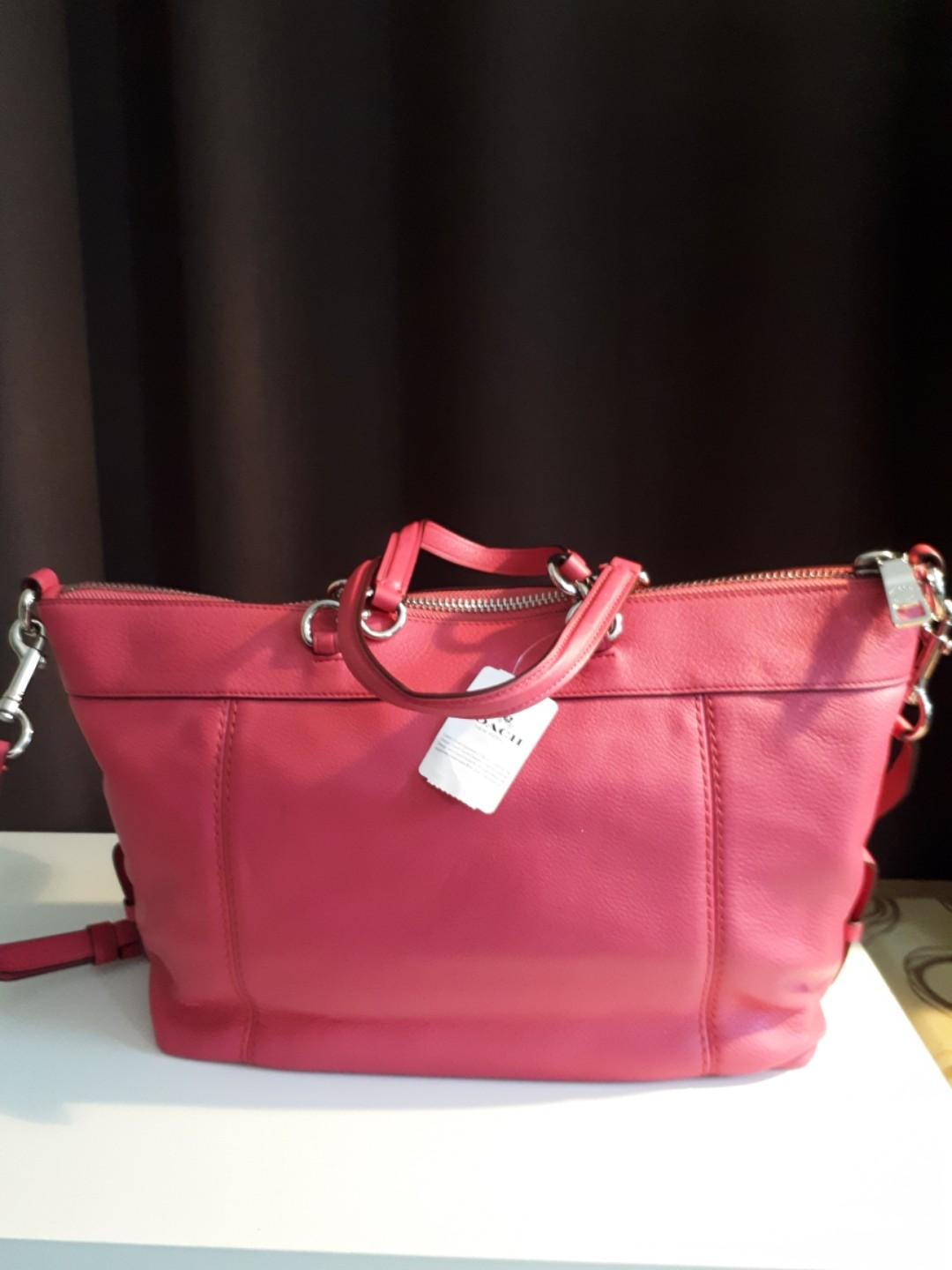 Coach 2 Way Bag (Category: Cross-body Bags) located in Cagayan de Oro. Submitted by mystuffurstuff (Listing ID 266072589, Image 2). Description: BNWT. Calf leather 2 way shoulder or sling bag. Unique Magenta Pink color. Bought from Coach outlet store Cabazon USA.