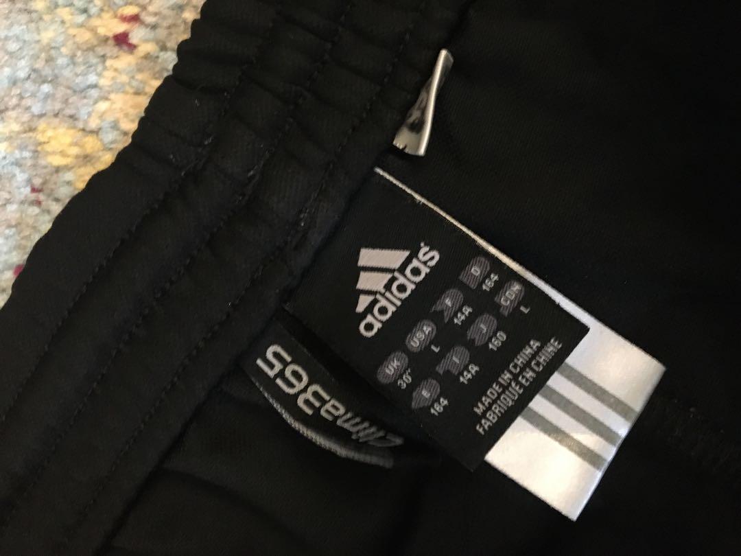 Adidas tracksuits made outlet in china
