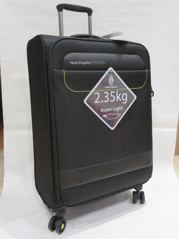 Hush Puppies - 24 Baggage (2.35 kg Super Light) Black, Hobbies u0026 Toys,  Travel, Luggage on Carousell