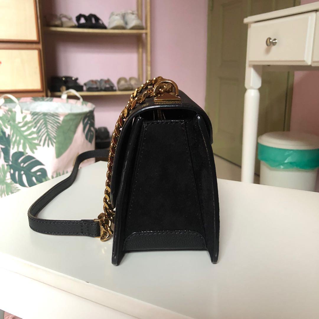 Metal push best sale lock crossbody bag