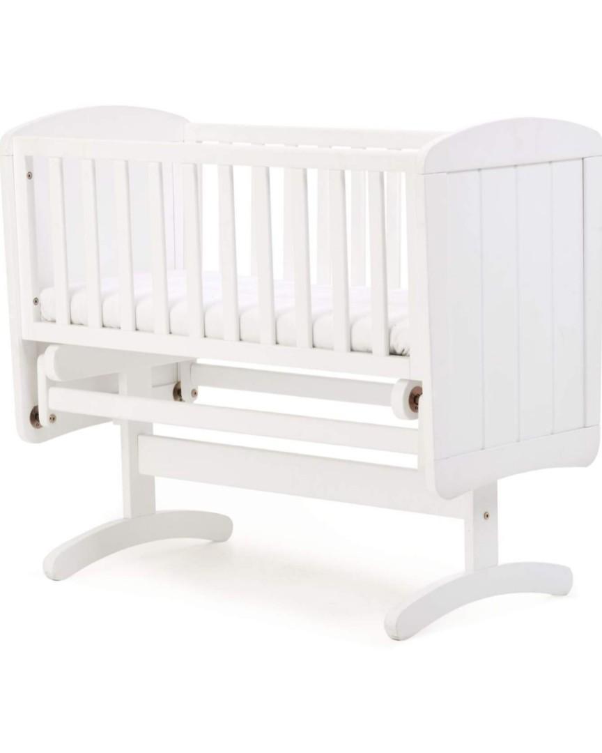 white rocking crib