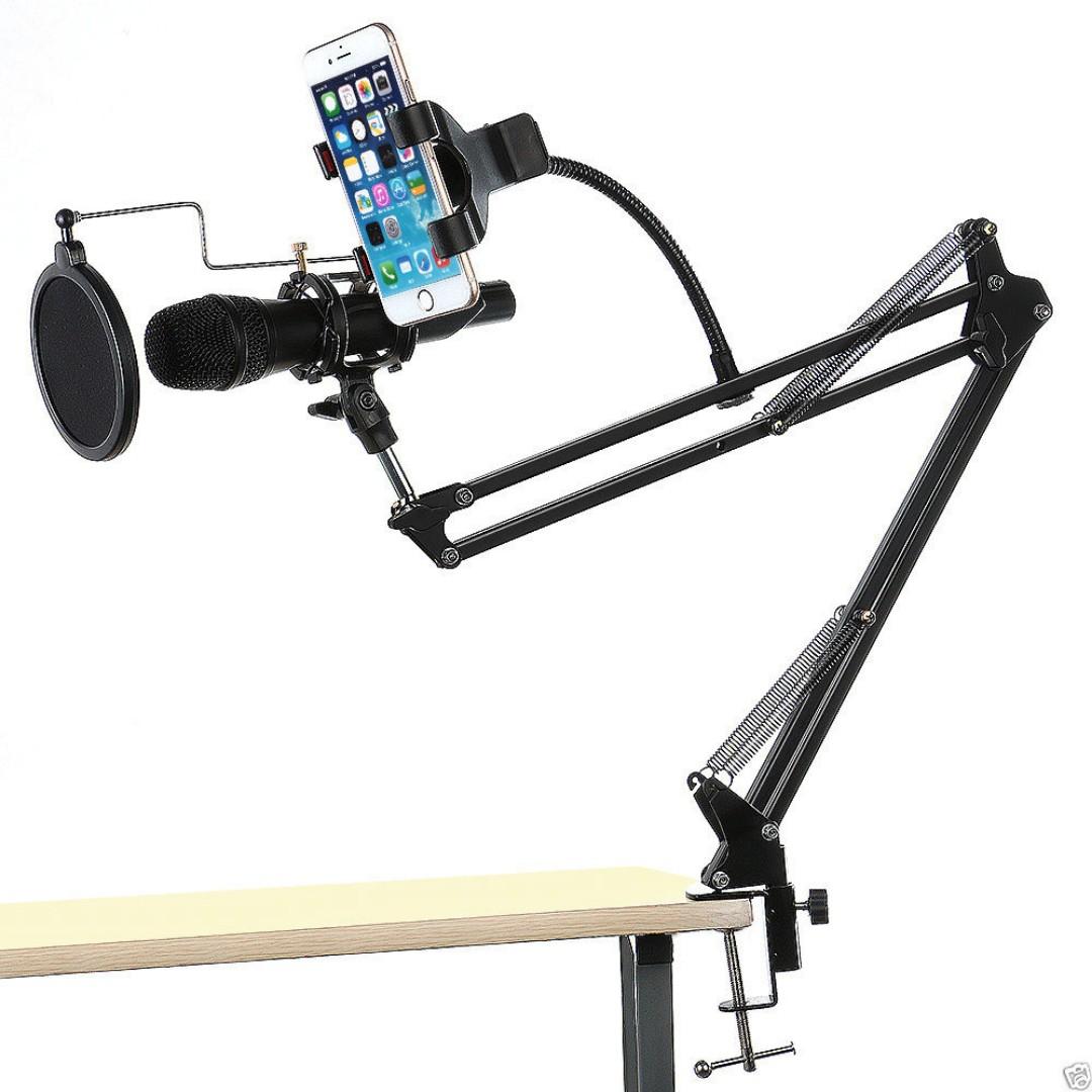 Smartphone Iphone Ipad Tablet Recording Microphone MIC Table Desktop Stand Bracket Holder (Category: Microphones) located in Manila. Submitted by kpicx (Listing ID 266573332, Image 1). Description: FEATURES: - Adjustable Scissor Arm Stand is made of high quality steel frame, sturdy and durable - Adjustable arms allow you to adjust the suitable angle - Steel Base Mounting Clamp, can be mounted on the announcers table securely - The Microphone Wind